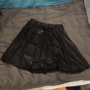 Black leather skater mini skirt